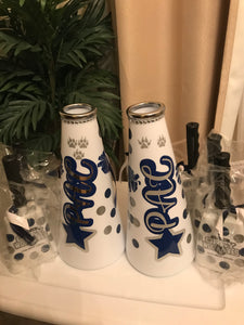 molded cheer horns and large cowbells